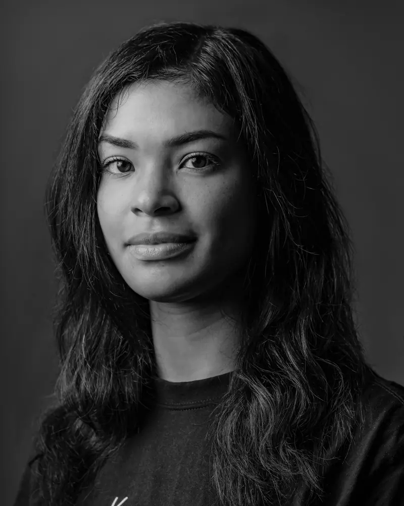 Amara Osei, with long dark waves